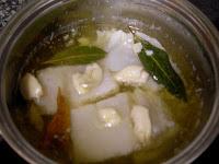 Bacalao confitado con pimientos y romesco de piñones