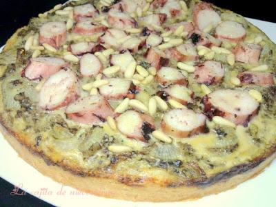 Coca de morcilla encebollada y pulpo con piñones