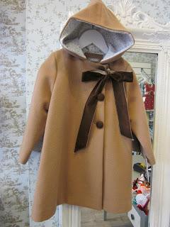 PARKAS Y ABRIGOS AL 50%