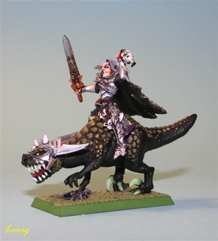 Malus Darkblade montando un gélido