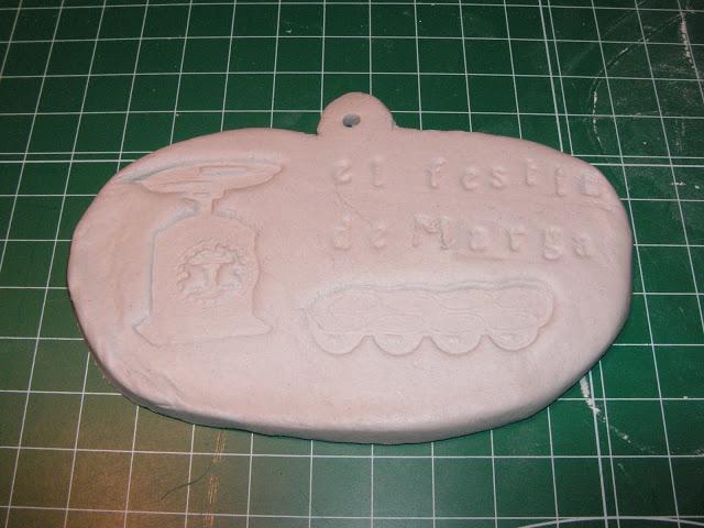 Bolsas de cartulina y colgantes de fimo