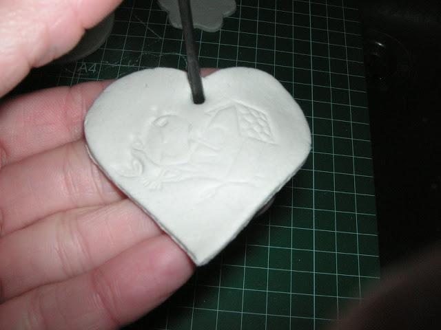 Bolsas de cartulina y colgantes de fimo