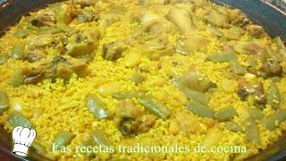 Receta de paella valenciana con pollo, conejo y costillas al estilo de la Ribera