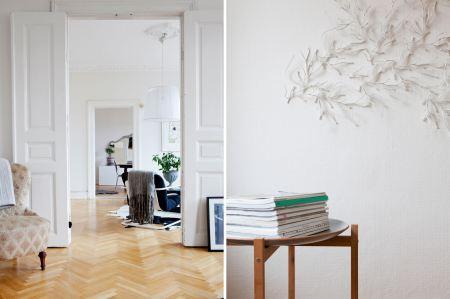 techos altos suelos de madera espigada muebles de diseño molduras de escayola mezcla estilos decoración mezcla de estilos de mobiliario ladrillo visto en la cocina interiorismo nórdico interiores nórdicos interiores escandinavos grandes ventanales estilo nórdico y escandinavo muebles y accesorios estilo nórdico diseño de interiores detalles arquitectónicos y de obra decoración interiores decoración ecléctica cojines bonitos decoración blog interiorismo blog interiores blog decoracoración blog decoración nórdica altas puertas de doble hoja en madera blanca 