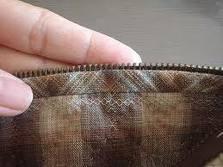 Cómo arreglar una cremallera en casa