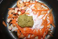 Fetuccini al pesto con langostinos