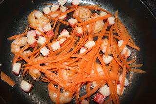 Fetuccini al pesto con langostinos