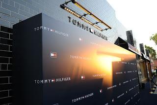 TOMMY HILFIGER, returns to the west coast