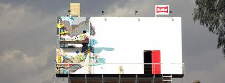 Una ilustradora vive en una valla publicitaria y transforma los tweets en arte Escriba