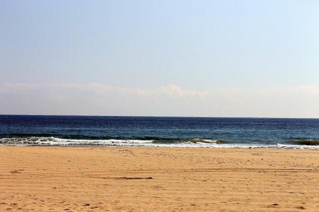 Red blazer on a day at the beach