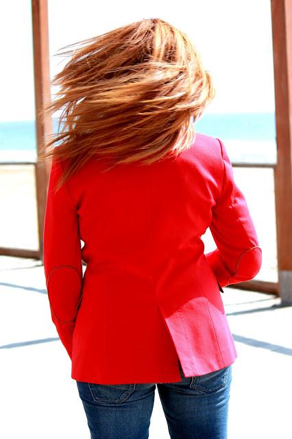 Red blazer on a day at the beach