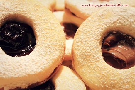 Occhi di bue, galletas rellenas de mermelada o nutella Occhi di bue, galletas rellenas de mermelada o nutella recetas dulces portada @es nutella @es mermelada galletas