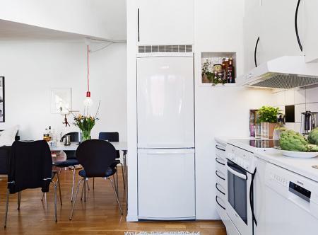 Buhardilla diáfana de 59 m² suelo de parquet de roble muebles de diseño interiores áticos abuhardillados estilo nórdico diseño buhardilla decoración nórdica decoración diáfana decoración buhardilla decoración áticos cocinas blancas cocina abierta salón blog decoración nórdica