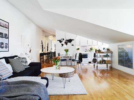 Buhardilla diáfana de 59 m² suelo de parquet de roble muebles de diseño interiores áticos abuhardillados estilo nórdico diseño buhardilla decoración nórdica decoración diáfana decoración buhardilla decoración áticos cocinas blancas cocina abierta salón blog decoración nórdica
