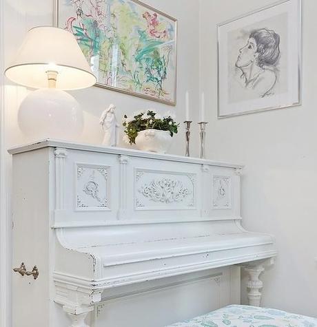 Another old white piano