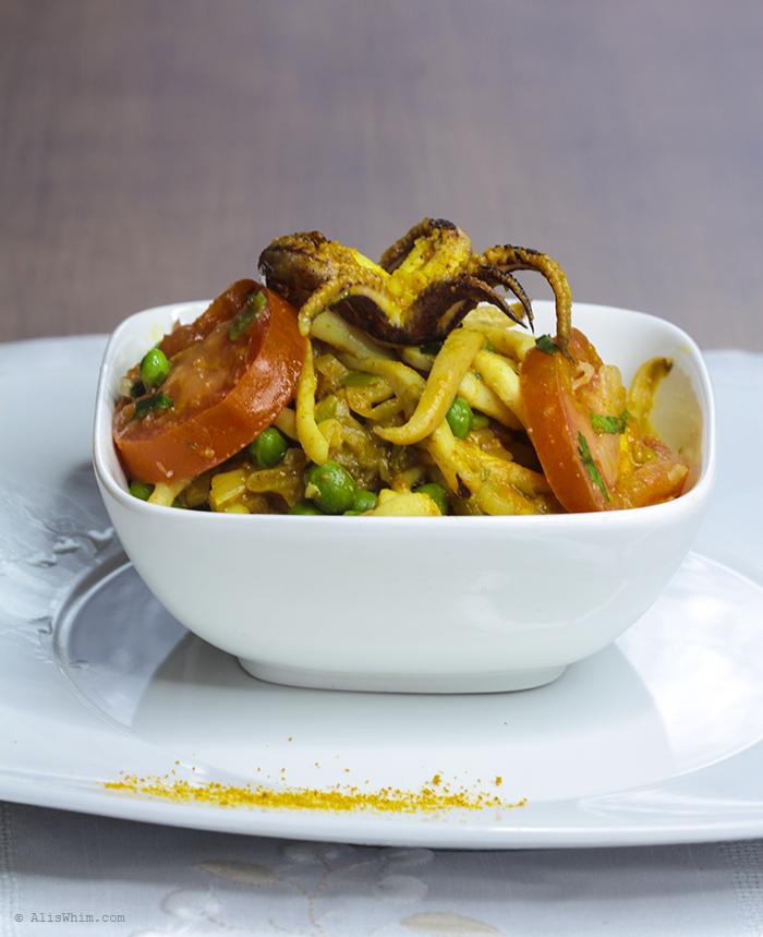 curry of squid tagliatelli with peas