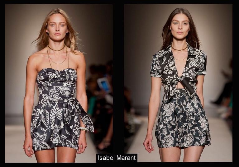 FLORES BLANCAS SOBRE MANICURA FRANCESA EN NEGRO