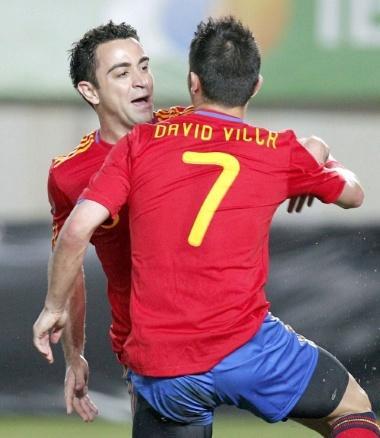 Jun. 08, 2010 - Murcia, Spain - epa02192657 Spain's national soccer team striker David Villa (R) and Xavi Hernandez celebrate after scoring against Poland during the international friendly test match between Spain and Poland at the Nueva Condomina stadium in Murcia, eastern Spain, 08 June 2010, in preparation for the FIFA World Cup 2010 in South Africa.