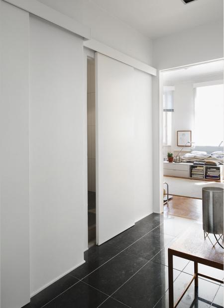 techos altos decoración suelo de parquet de roble espigado puerta corredera decoración productos de diseño piso nórdico diáfano muebles de diseño diseño de interiores decoración nórdica decoración de interiores Bulthaup y Gaggenau blog decoración 