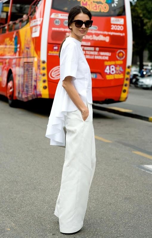 STREET-STYLE-WHITE-PEPLUM-AND-FRILLS-MILAN-FASHION-WEEK-PEPLUM-BACK-TOP-WIDE-LEG-WHITE-PANT-VIA-VOGUE-UK-Leila-Yavari