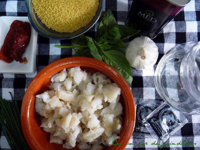 Cous-cous negro con bacalao desmigado y su pil-pil de azafrán.