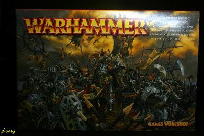 Portada de la caja de Regimiento del Caos