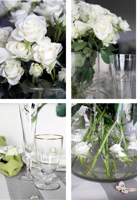 UNA MESA DECORADA CON ROSAS PARA UNA CELEBRACION