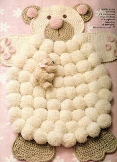 ALFOMBRA CON POMPONES DE LA WEB