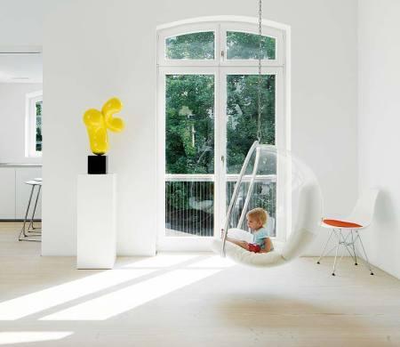 suelos de madera dinesen sofás piero lissoni sillón Swan de Arne Jacobsen mesa Tulip de Eero Saarinen lámpara Artichoke de Poul Henningsen diseño de interiores decoración nórdica escandinava decoración muebles de diseño decoración minimalista blog decoración nordica escandinava 