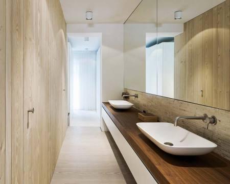 suelos de madera dinesen sofás piero lissoni sillón Swan de Arne Jacobsen mesa Tulip de Eero Saarinen lámpara Artichoke de Poul Henningsen diseño de interiores decoración nórdica escandinava decoración muebles de diseño decoración minimalista blog decoración nordica escandinava 