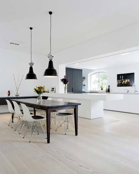 suelos de madera dinesen sofás piero lissoni sillón Swan de Arne Jacobsen mesa Tulip de Eero Saarinen lámpara Artichoke de Poul Henningsen diseño de interiores decoración nórdica escandinava decoración muebles de diseño decoración minimalista blog decoración nordica escandinava 