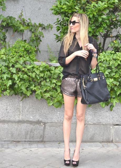 Silver shorts and black shirt