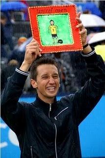 Stakhovsky y Henin, campeones en Hertogenbosch