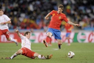 June 16, 2010 - South Africa - Football - Spain v Switzerland FIFA World Cup South Africa 2010 - Group H - Durban Stadium, Durban, South Africa - 16/6/10..Spain's Fernando Torres and Switzerland's Stephan Lichtsteiner (L) in action.