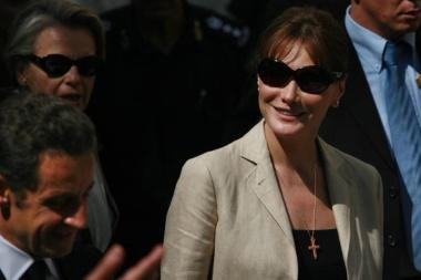 BETHLEHEM, WEST BANK -JUNE 24: (ISRAEL OUT) French President Nicolas Sarkozy and First Lady Carla Bruni-Sarkozy leave after their visit to the Church of the Nativity June 24, 2008 in the West Bank Palestinian city of Bethlehem.  Sarkozy stated Tuesday that the creation of a Palestinian state was 'a priority' for France. (Photo by Uriel Sinai/Getty Images)