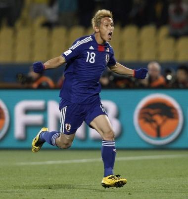 June 24, 2010 - South Africa - Football - Denmark v Japan FIFA World Cup South Africa 2010 - Group E - Royal Bafokeng Stadium, Rustenburg, South Africa - 24/6/10..Keisuke Honda celebrates after scoring Japan's first goal.