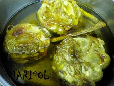 Alcachofas confitadas y lomo de bonito