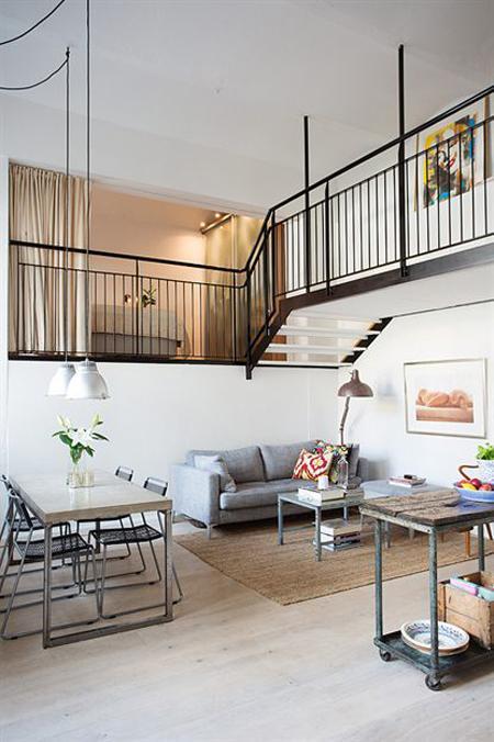 Loft de 67 m² de estilo nórdico industrial techos altos aprovechar espacio decoración loft industrial decoración grandes ventanales decoración estilo industrial moderno loft distribución loft pequeño diseño y decoración de lofts dos pisos decoración estilo nórdico industrial decoración abierta loft industrial decoración abierta diáfana de loft con escalera blog diseño y decoración nordica barandilla escalera caracol loft