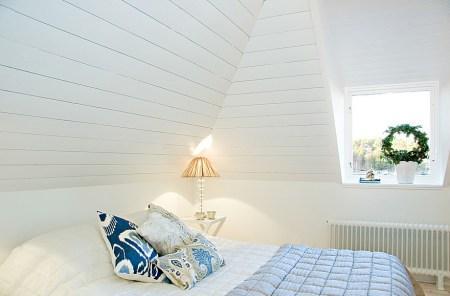 salones y comedores nórdicos panelado de madera blanco estilo nórdico decoración interiores nórdico decoración escandinava decoración de verano en blanco casas de vacaciones en países nórdicos casas con vistas al mar decoración blog decoración nórdica 