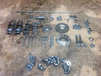 Piezas metálicas de la Impala después del zincado