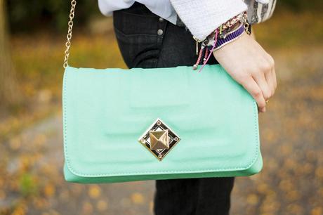White Blazer And Mint Clutch