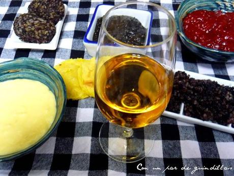 Timbal de morcilla y mermelada de chiles sobre torto de maíz