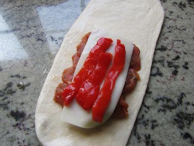 Montaditos de lomo con pimientos