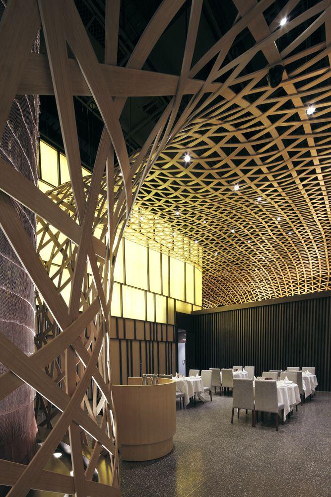 1304104991 tp 290411 07 Restaurante Revestido con una Malla Geométrica de Bamboo   Tang Palace Restaurant