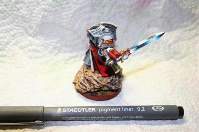 pintar letras a los pergaminos y libros de Lord Kaldor Draigo