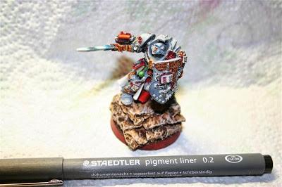 pintar letras a los pergaminos y libros de Lord Kaldor Draigo