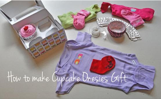 Bodies de bebé en caja de cupcakes