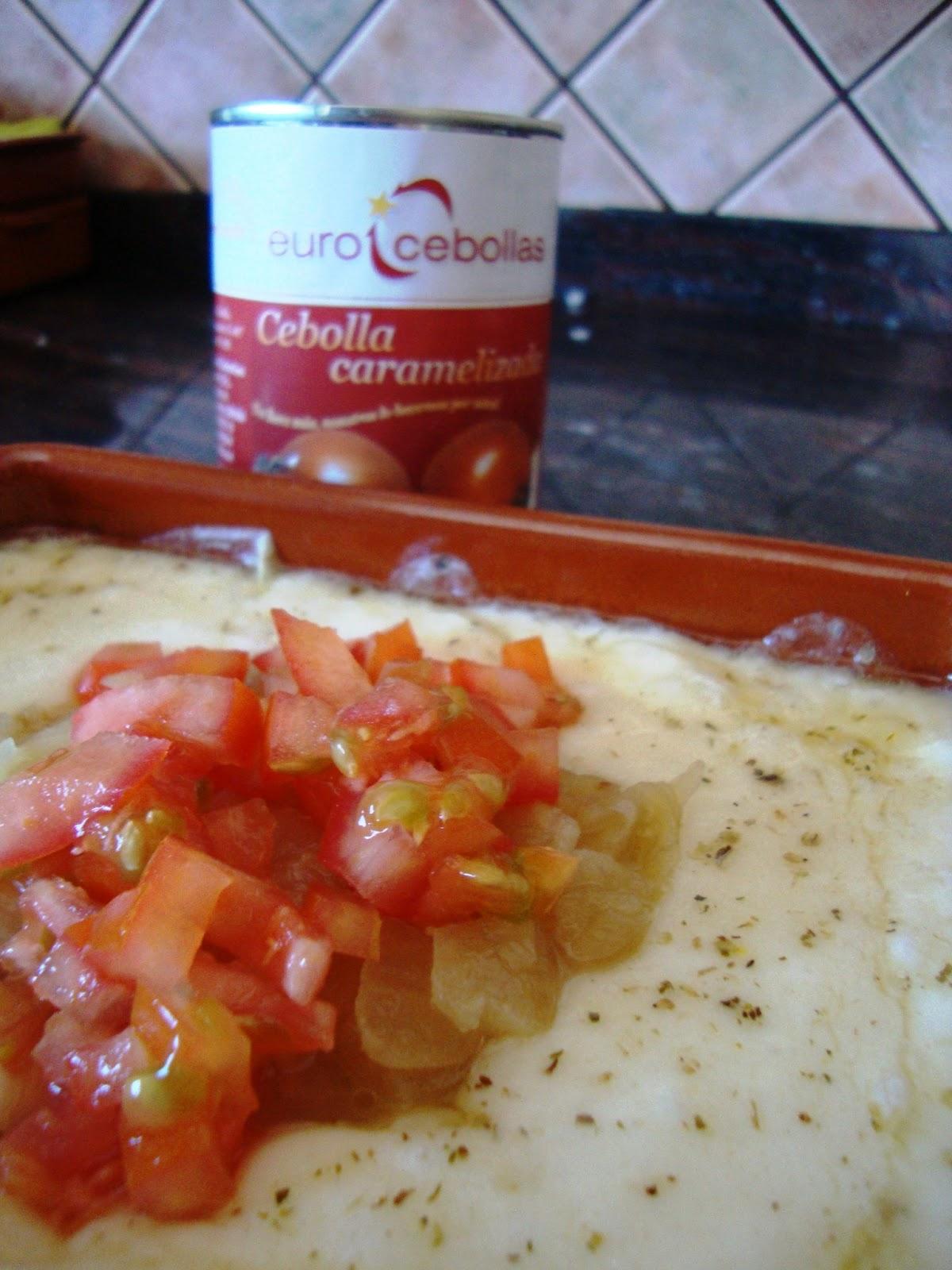 Queso Provolone con cebolla caramelizada y tomate troceado