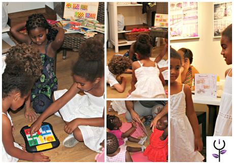 Taller sobre cabello afro con Peinando Nubes Niñas jugando