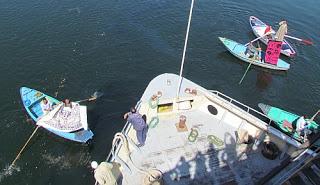 Vendedores en canoas. Egipto